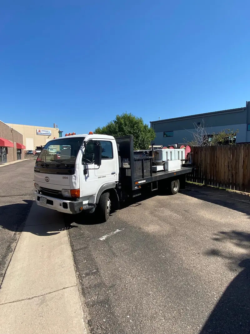 2002 U.S. Jetting 4025-600 Dual-Reel Truck-Mounted Jetting System on Nissan 1200 UD Chassis